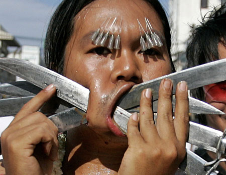  third devotee opts for regular knives, with some added eyebrow piercings